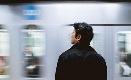 Japanese commuter looking the other way