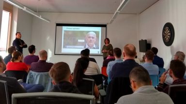 Training session with audience and powerpoint