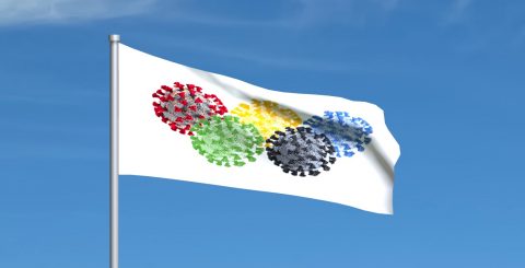 A flag flying showing colourful versions of the corona virus